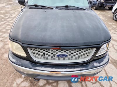 Zdjęcie 11 z 12 samochodu: 1999 FORD F150 VIN:2FTRX18LXXCA12327 - miniatura