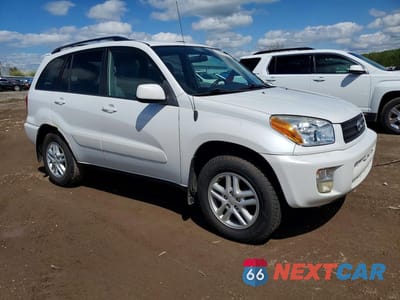 Czwarte zdjęcie samochodu z boku: 2002 TOYOTA RAV4 BASE VIN:JTEGH20V520058280 - miniatura