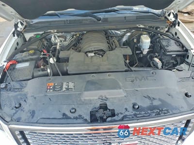 Zdjęcie 12 z 13 samochodu: 2015 GMC YUKON DENALI VIN:1GKS1CKJ0FR687700 - miniatura