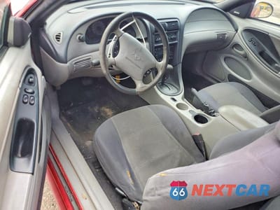 Zdjęcie 8 z 12 samochodu: 2002 FORD MUSTANG VIN:1FAFP40462F102084 - miniatura