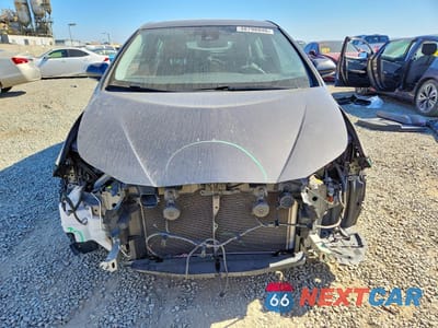 Piąte zdjęcie samochodu w środku: 2016 TOYOTA PRIUS FOUR VIN:JTDKARFU7G3503635 - miniatura