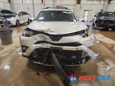 Piąte zdjęcie samochodu w środku: 2016 TOYOTA RAV4 HYBRID LIMITED VIN:JTMDJREV3GD034685 - miniatura