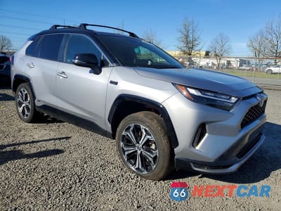 Czwarte zdjęcie samochodu z boku: 2023 TOYOTA RAV4 PRIME XSE VIN:JTMEB3FV8PD124024 - miniatura