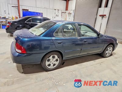 Trzecie zdjęcie samochodu z tyłu: 2003 NISSAN SENTRA XE VIN:3N1CB51DX3L817668 - miniatura