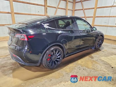 Trzecie zdjęcie samochodu z tyłu: 2023 TESLA MODEL Y VIN:7SAYGDEF4PF788069 - miniatura
