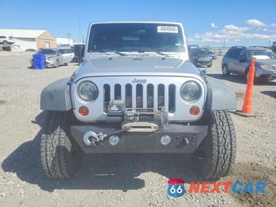 Piąte zdjęcie samochodu w środku: 2012 JEEP WRANGLER UNLIMITED SPORT VIN:1C4BJWDG6CL215045 - miniatura