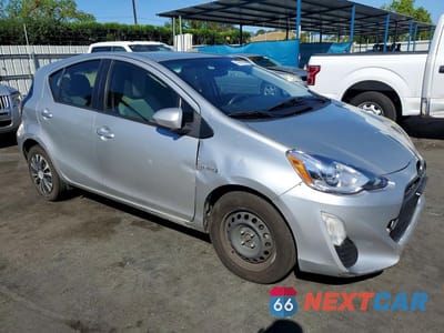 Czwarte zdjęcie samochodu z boku: 2016 TOYOTA PRIUS C ONE VIN:JTDKDTB37G1133106 - miniatura