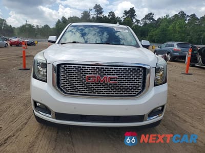 Piąte zdjęcie samochodu w środku: 2017 GMC YUKON DENALI VIN:1GKS1CKJ5HR213163 - miniatura