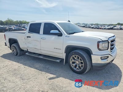 Czwarte zdjęcie samochodu z boku: 2018 GMC SIERRA K1500 SLT VIN:3GTU2NEC8JG427628 - miniatura