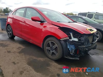 Czwarte zdjęcie samochodu z boku: 2013 HYUNDAI ELANTRA GT BASE VIN:KMHD35LE1DU084644 - miniatura