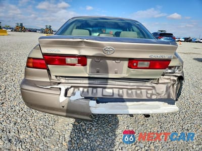 Zdjęcie 6 z 12 samochodu: 1999 TOYOTA CAMRY LE VIN:JT2BG28K2X0343353 - miniatura