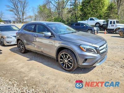Czwarte zdjęcie samochodu z boku: 2015 MERCEDES-BENZ GLA 250 4MATIC VIN:WDCTG4GB2FJ028953 - miniatura
