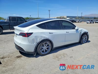 Trzecie zdjęcie samochodu z tyłu: 2023 TESLA MODEL Y VIN:7SAYGAEE8PF661248 - miniatura