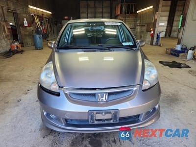 Piąte zdjęcie samochodu w środku: 2007 HONDA FIT S VIN:JHMGD38667S058057 - miniatura
