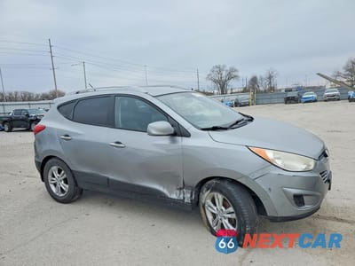 Czwarte zdjęcie samochodu z boku: 2010 HYUNDAI TUCSON GLS VIN:KM8JU3AC3AU111067 - miniatura