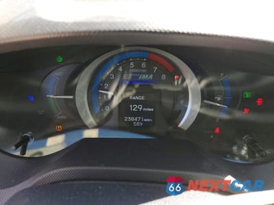 Zdjęcie 9 z 11 samochodu: 2010 HONDA INSIGHT EX VIN:JHMZE2H74AS025378 - miniatura