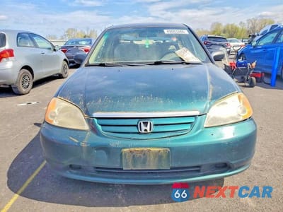 Piąte zdjęcie samochodu w środku: 2001 HONDA CIVIC LX VIN:JHMES16551S006597 - miniatura