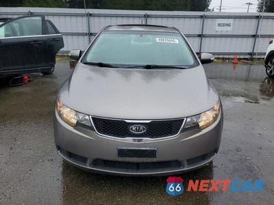 Piąte zdjęcie samochodu w środku: 2010 KIA FORTE EX VIN:KNAFU4A26A5250768 - miniatura