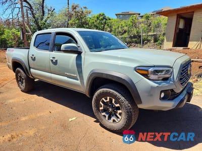 Czwarte zdjęcie samochodu z boku: 2023 TOYOTA TACOMA SR V6 VIN:3TYCZ5AN1PT125031 - miniatura