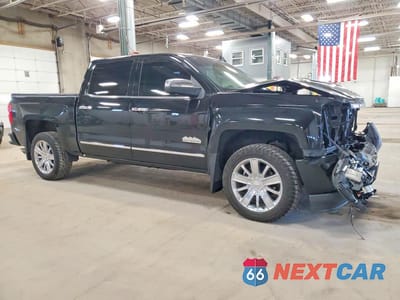 Czwarte zdjęcie samochodu z boku: 2018 CHEVROLET SILVERADO K1500 HIGH COUNTRY VIN:3GCUKTEC9JG508125 - miniatura
