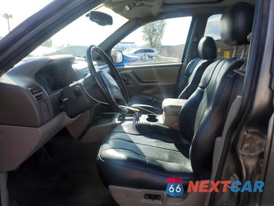 Zdjęcie 7 z 12 samochodu: 2000 JEEP GRAND CHEROKEE LAREDO VIN:1J4G248S2YC227054 - miniatura