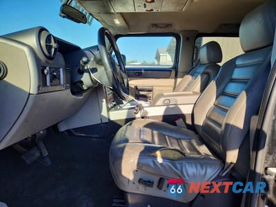 Zdjęcie 7 z 13 samochodu: 2003 HUMMER H2 VIN:5GRGN23U13H107489 - miniatura