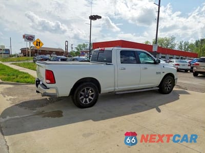 Czwarte zdjęcie samochodu z boku: 2017 RAM 1500 SLT VIN:1C6RR6TT3HS786373 - miniatura