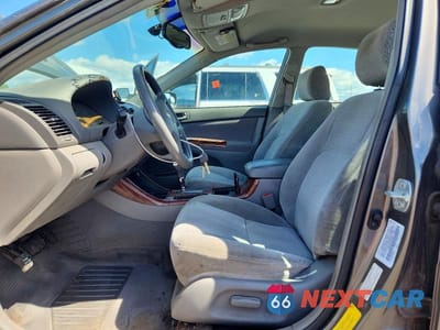 Zdjęcie 7 z 11 samochodu: 2003 TOYOTA CAMRY XLE VIN:4T1BE30K93U708625 - miniatura