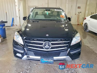 Piąte zdjęcie samochodu w środku: 2015 MERCEDES-BENZ ML 350 4MATIC VIN:4JGDA5HB9FA593194 - miniatura