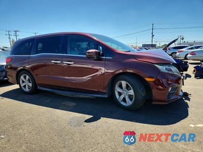 Czwarte zdjęcie samochodu z boku: 2020 HONDA ODYSSEY EXL VIN:5FNRL6H7XLB033306 - miniatura