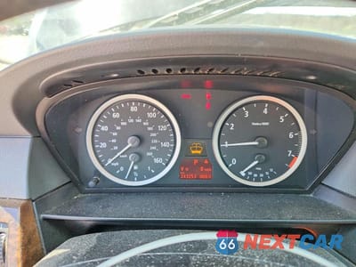 Zdjęcie 9 z 11 samochodu: 2006 BMW 525 I VIN:WBANE53506CK78560 - miniatura