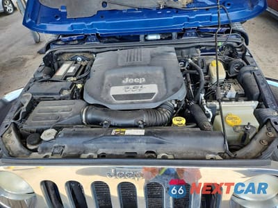 Zdjęcie 12 z 13 samochodu: 2013 JEEP WRANGLER UNLIMITED SAHARA VIN:1C4BJWEG3DL552465 - miniatura