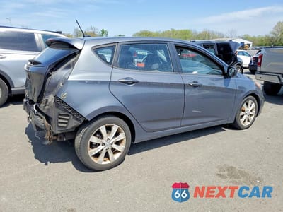 Trzecie zdjęcie samochodu z tyłu: 2012 HYUNDAI ACCENT SE VIN:KMHCU5AEXCU041267 - miniatura