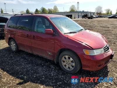 Czwarte zdjęcie samochodu z boku: 2003 HONDA ODYSSEY EXL VIN:5FNRL180X3B159882 - miniatura