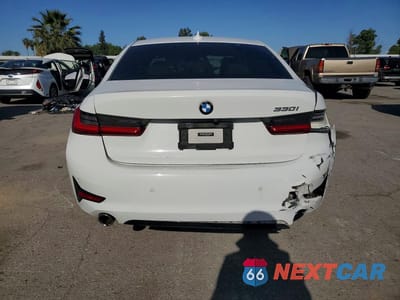 Zdjęcie 6 z 12 samochodu: 2021 BMW 330I VIN:3MW5R1J06M8B63566 - miniatura