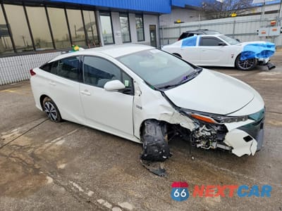 Czwarte zdjęcie samochodu z boku: 2017 TOYOTA PRIUS PRIME PREMIUM VIN:JTDKARFP7H3011585 - miniatura
