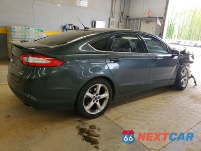 Trzecie zdjęcie samochodu z tyłu: 2016 FORD FUSION SE VIN:3FA6P0HD8GR210441 - miniatura
