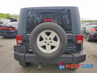 Zdjęcie 6 z 12 samochodu: 2007 JEEP WRANGLER SAHARA VIN:1J4FA54137L132308 - miniatura