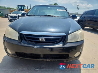 Piąte zdjęcie samochodu w środku: 2005 KIA SPECTRA LX VIN:KNAFE121755150976 - miniatura