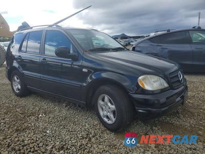 Czwarte zdjęcie samochodu z boku: 2000 MERCEDES-BENZ ML 320 VIN:4JGAB54E2YA165891 - miniatura