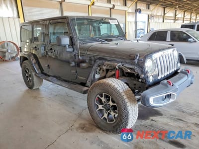Czwarte zdjęcie samochodu z boku: 2017 JEEP WRANGLER UNLIMITED SAHARA VIN:1C4BJWEG2HL752162 - miniatura
