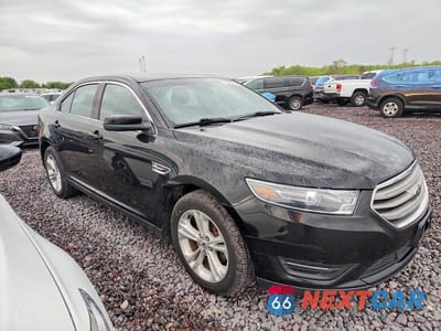 Czwarte zdjęcie samochodu z boku: 2017 FORD TAURUS SEL VIN:1FAHP2E8XHG116937 - miniatura