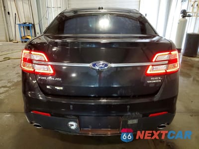 Zdjęcie 6 z 12 samochodu: 2014 FORD TAURUS SEL VIN:1FAHP2E81EG156125 - miniatura
