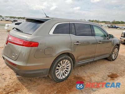Trzecie zdjęcie samochodu z tyłu: 2012 LINCOLN MKT VIN:2LMHJ5AT8CBL55054 - miniatura