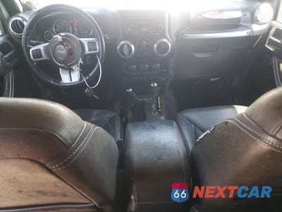 Zdjęcie 8 z 12 samochodu: 2013 JEEP WRANGLER UNLIMITED SPORT VIN:1C4HJWDG3DL591052 - miniatura