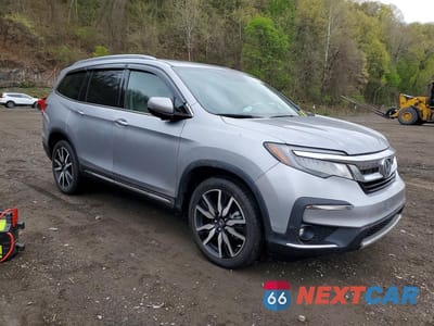 Czwarte zdjęcie samochodu z boku: 2022 HONDA PILOT TOURING VIN:5FNYF6H68NB013567 - miniatura