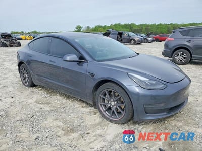 Czwarte zdjęcie samochodu z boku: 2021 TESLA MODEL 3 VIN:5YJ3E1EB0MF048958 - miniatura