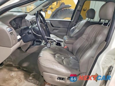 Zdjęcie 7 z 12 samochodu: 2002 JEEP GRAND CHEROKEE LAREDO VIN:1J4GW48N02C278400 - miniatura