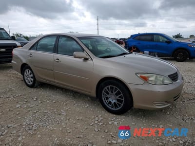 Czwarte zdjęcie samochodu z boku: 2002 TOYOTA CAMRY XLE V6 VIN:4T1BF30K82U531626 - miniatura