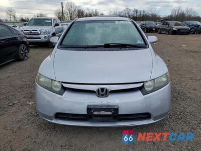 Piąte zdjęcie samochodu w środku: 2007 HONDA CIVIC LX VIN:2HGFA16517H302002 - miniatura